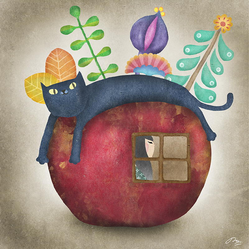 りんごの上にかぶさる猫